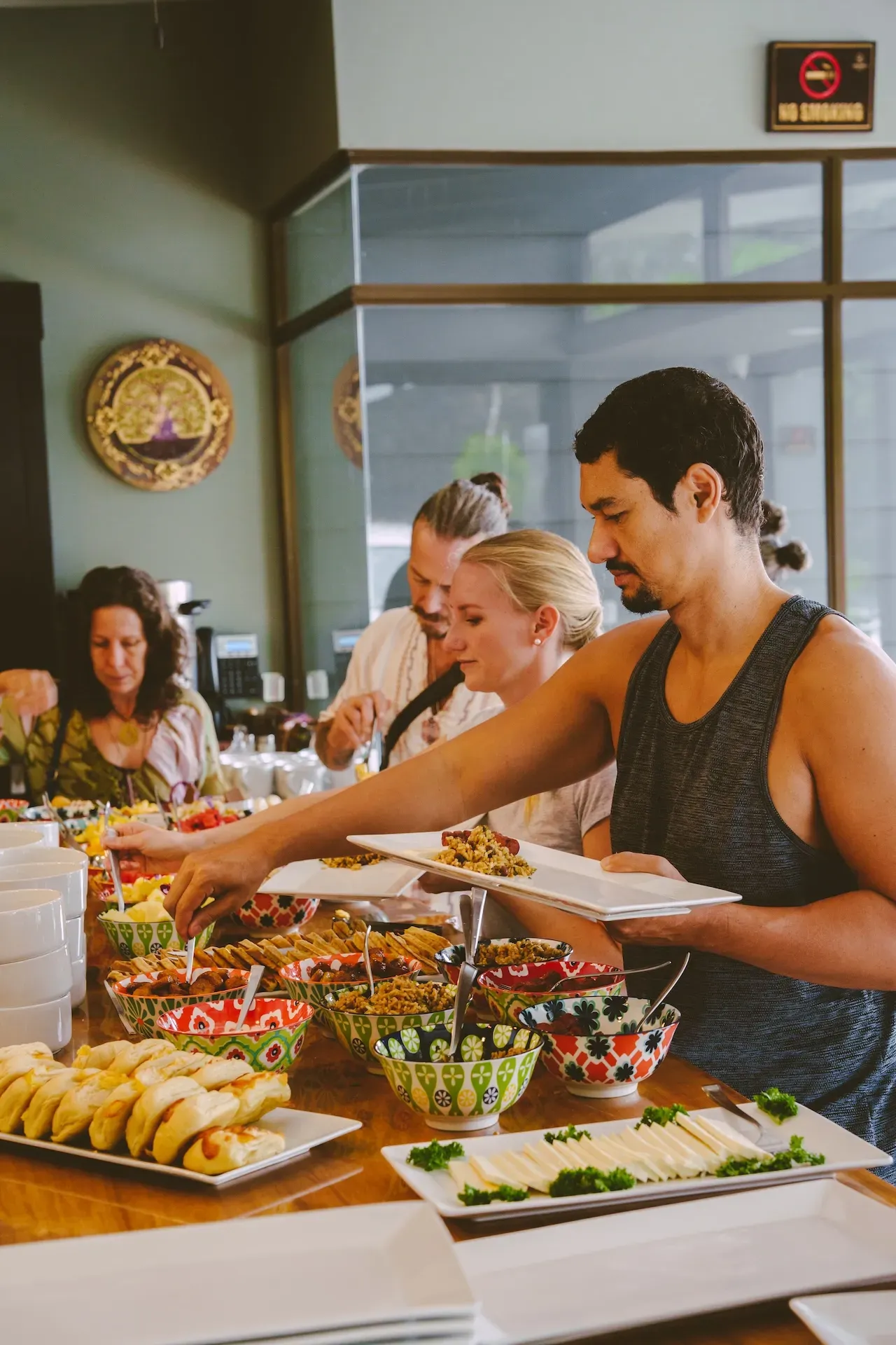 Retreat guests helping themselves to fresh, regional food.