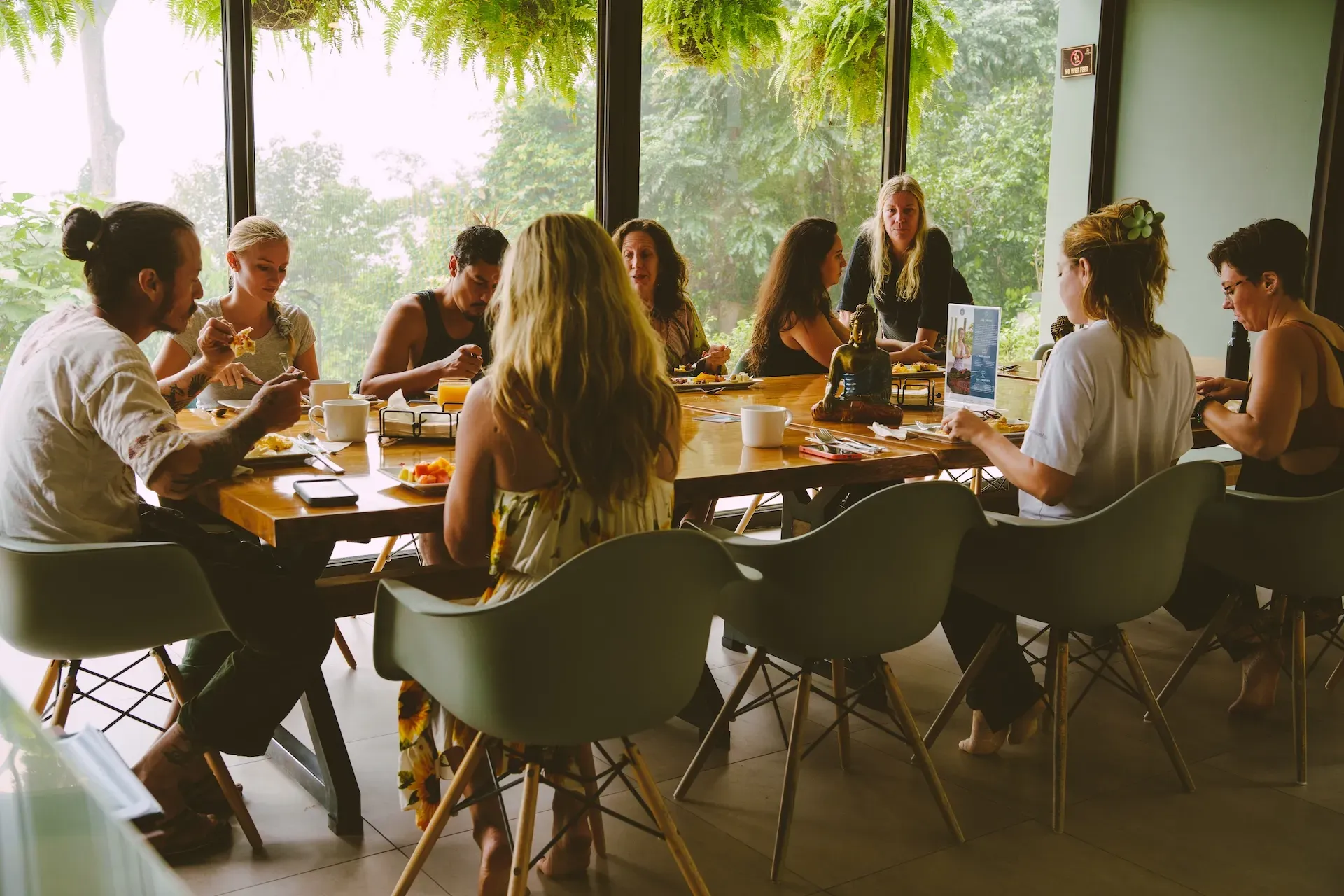 People enjoying a farm-to-table meal at Vajra Jahra retreat center.