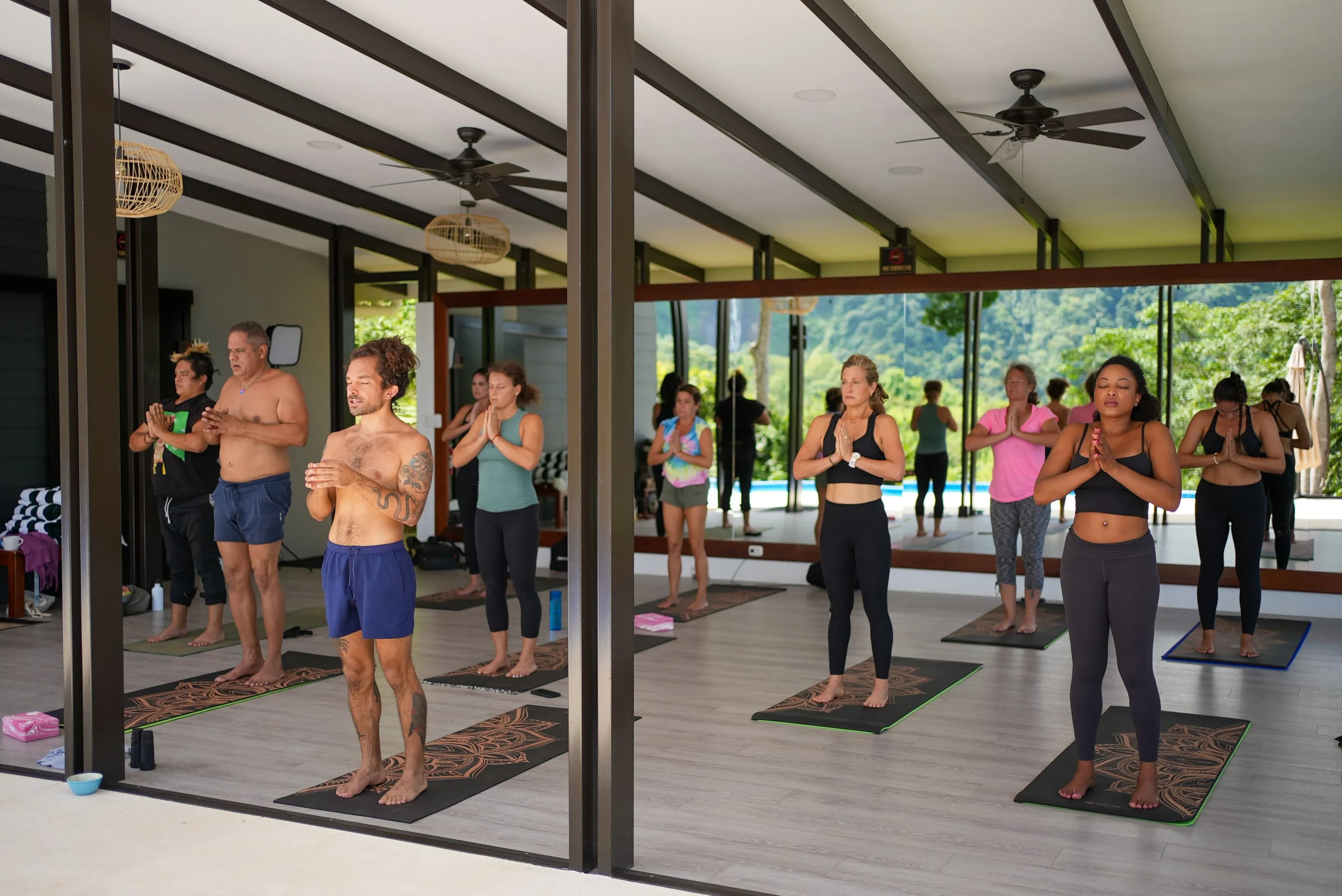 Spacious open-air yoga shala at Vajra Jahra Retreat Center where guests gather to host a yoga retreat.