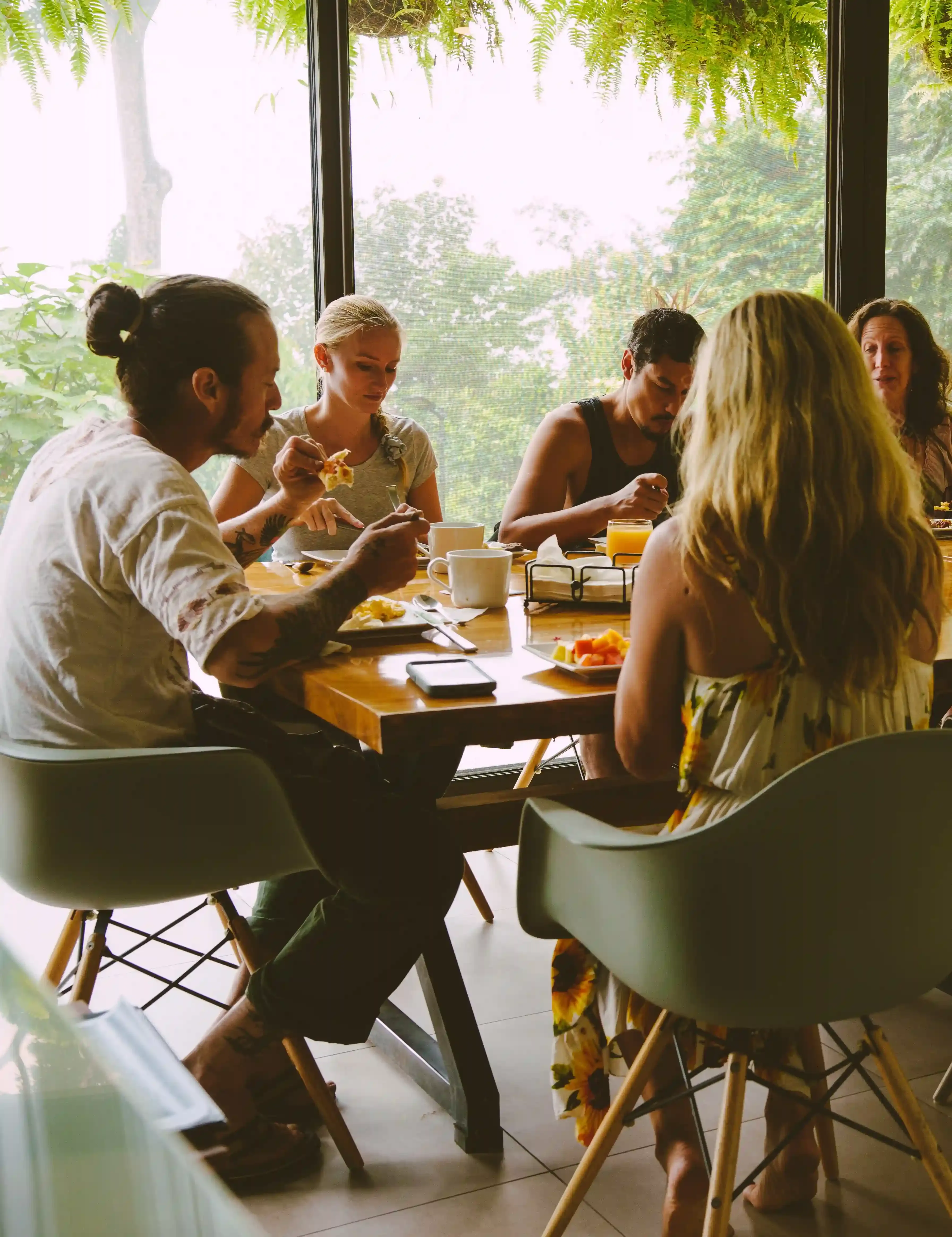 Family enjoying a meal in the al-fresco dining area.