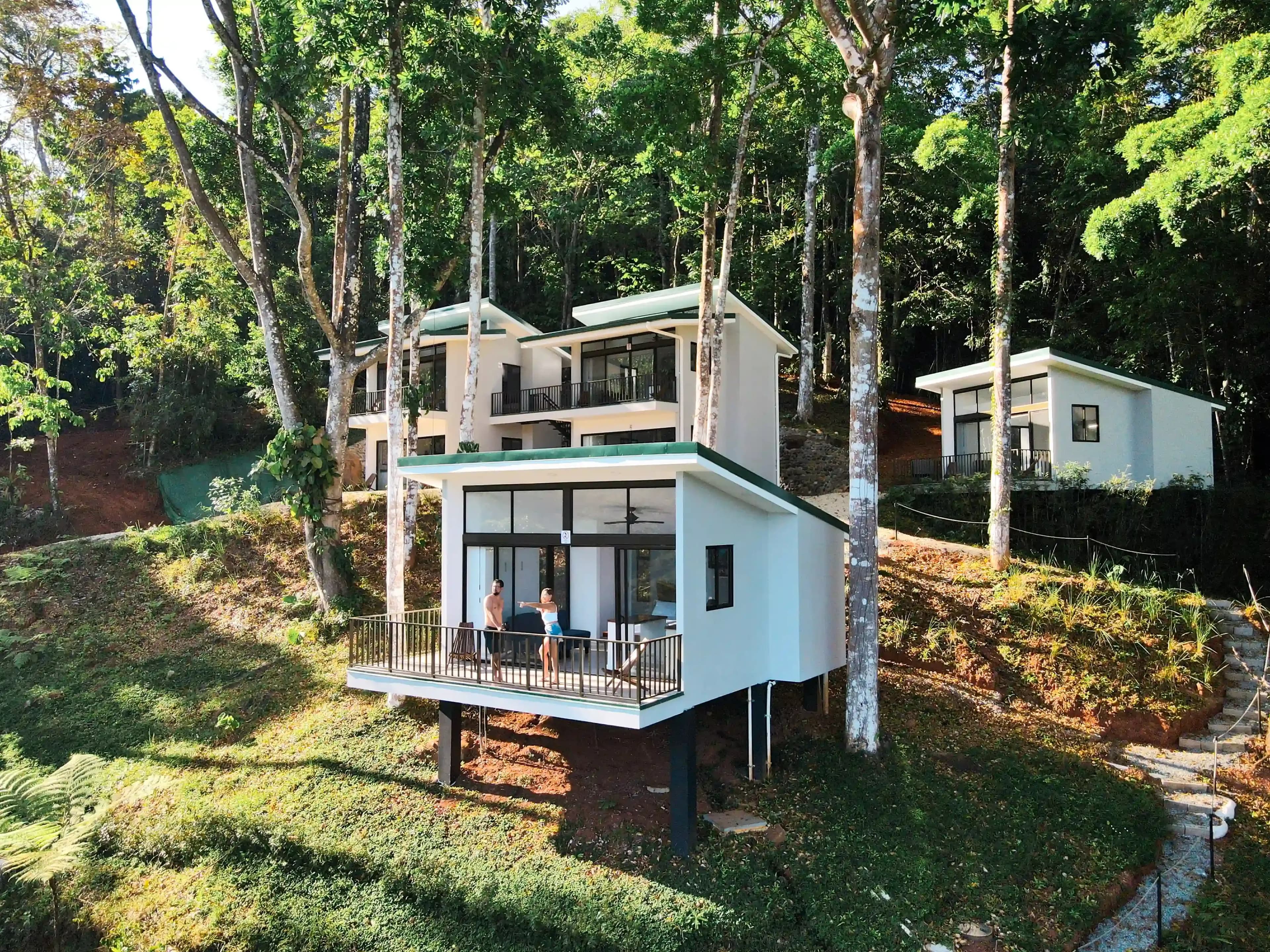 Exterior view of the Vajra Jahra vacation rentals for large groups. Six out of the twelve villas are visible.