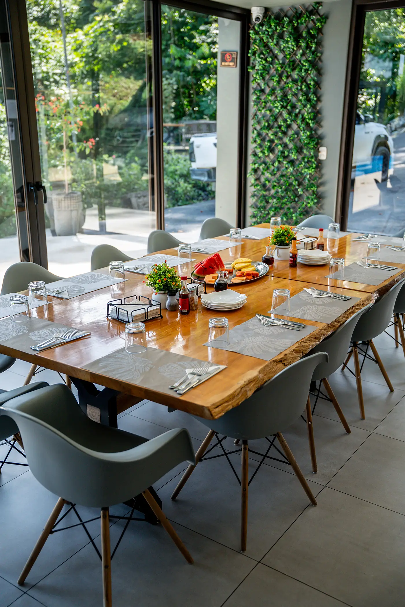 Dining table set for guests at Vajra Jahra, creating a welcoming space for shared meals and connection.