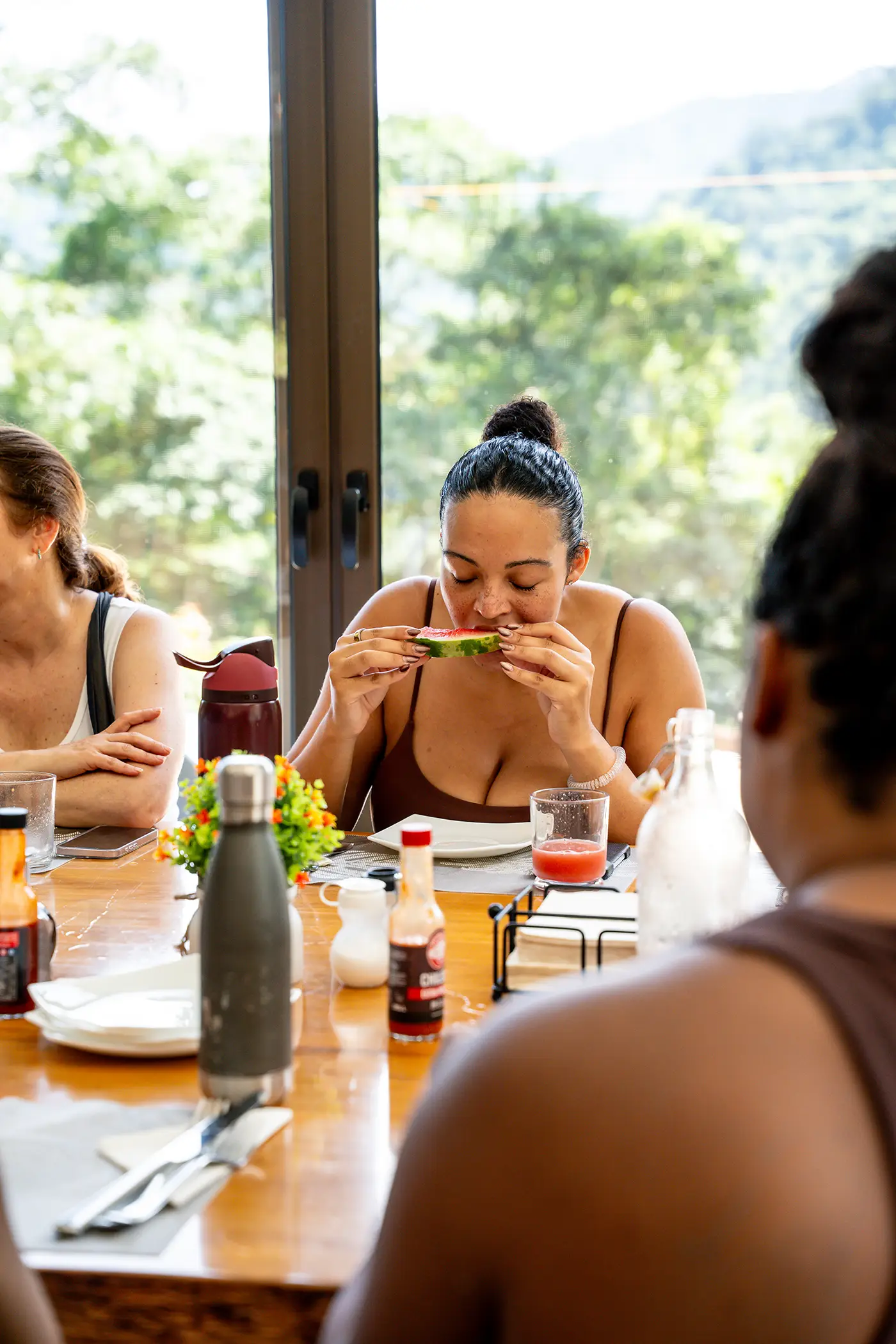 Guest enjoying a fresh meal at Vajra Jahra, highlighting the nourishing dining experience of the Wellness Retreat Center.