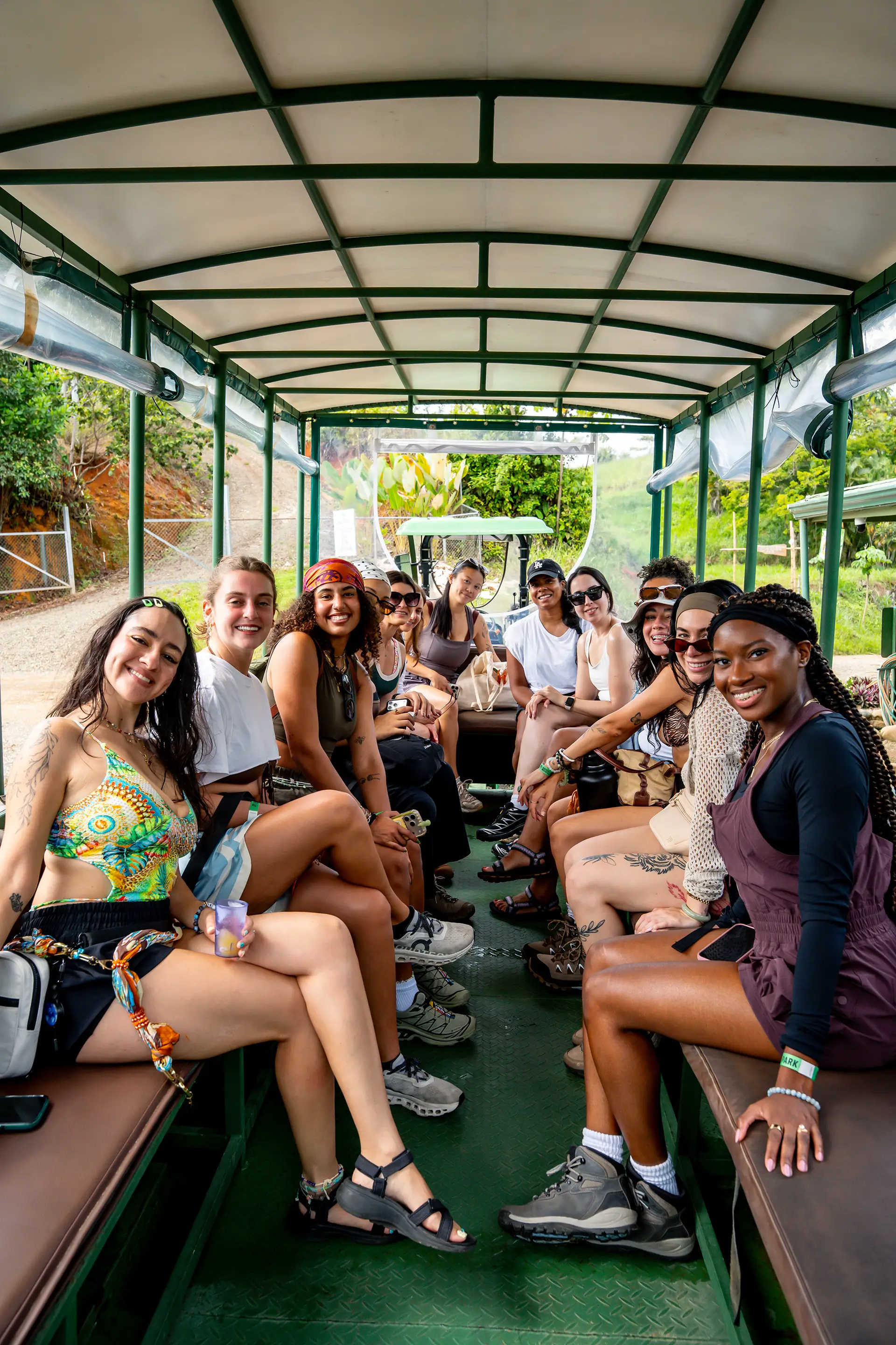 Group of retreat participants seated in a safari truck during an off-site adventure organized by Vajra Jahra, a Costa Rica Retreat Center.