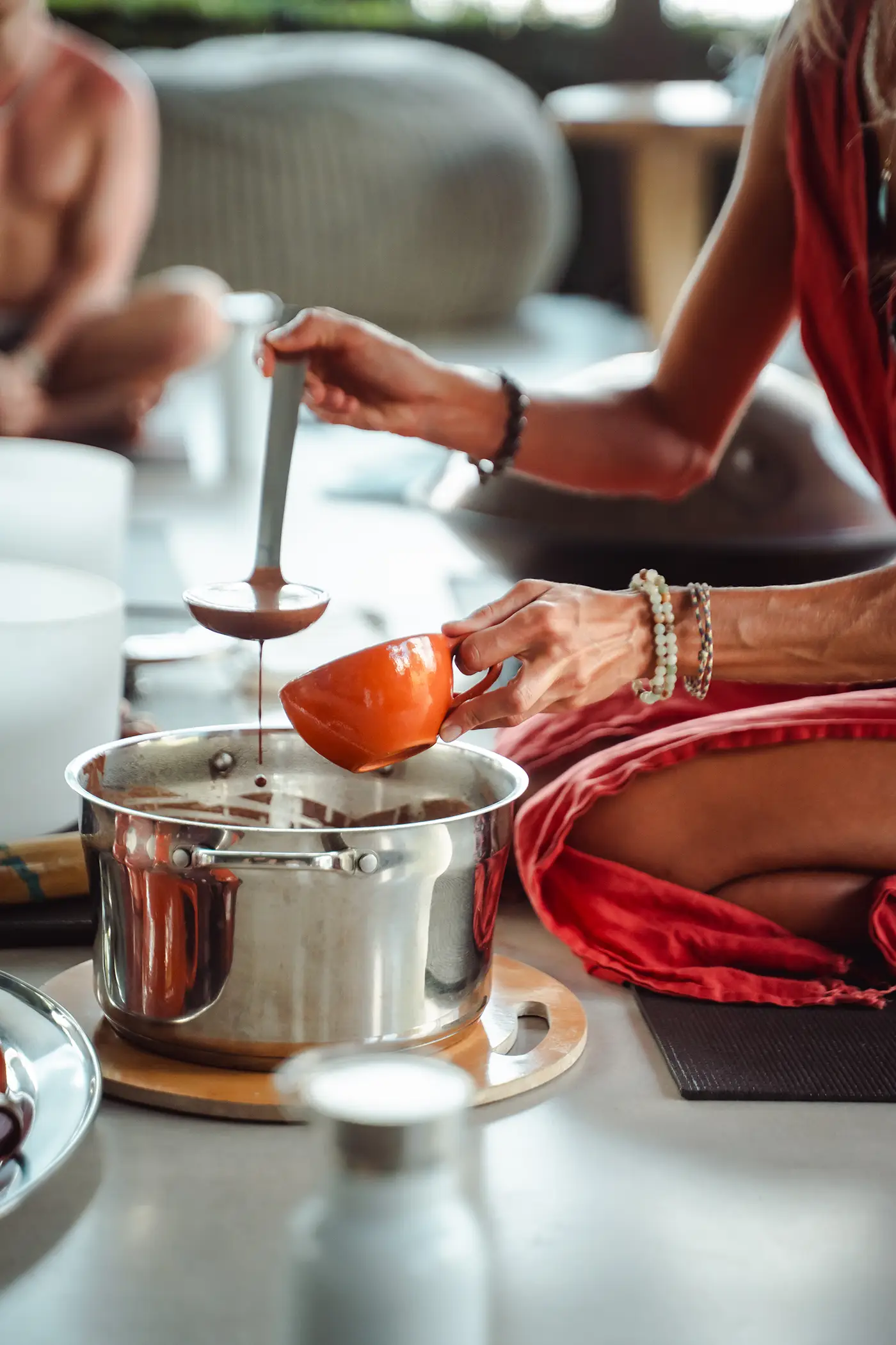 Ceremonial cacao being prepared at Vajra Jahra, reflecting the grounding rituals of the Wellness Retreat Center.