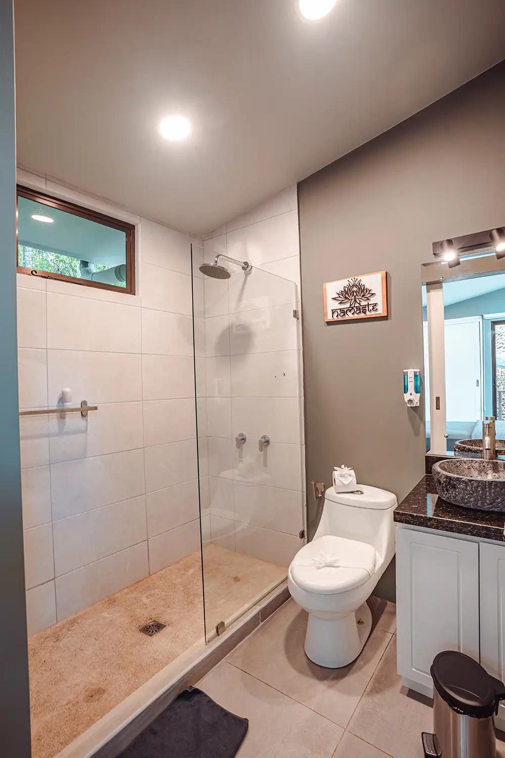 Private bathroom with a walk-in shower at Vajra Jahra, offering a comfortable and relaxing retreat experience in Costa Rica.