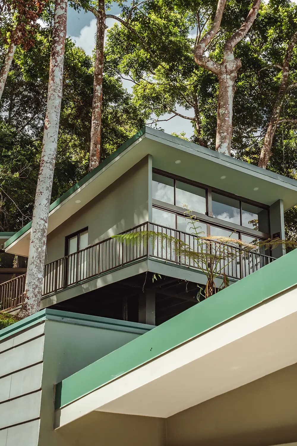 Spacious multi-level villa surrounded by jungle at Vajra Jahra, a Costa Rica Retreat Center offering modern accommodations for retreat groups.