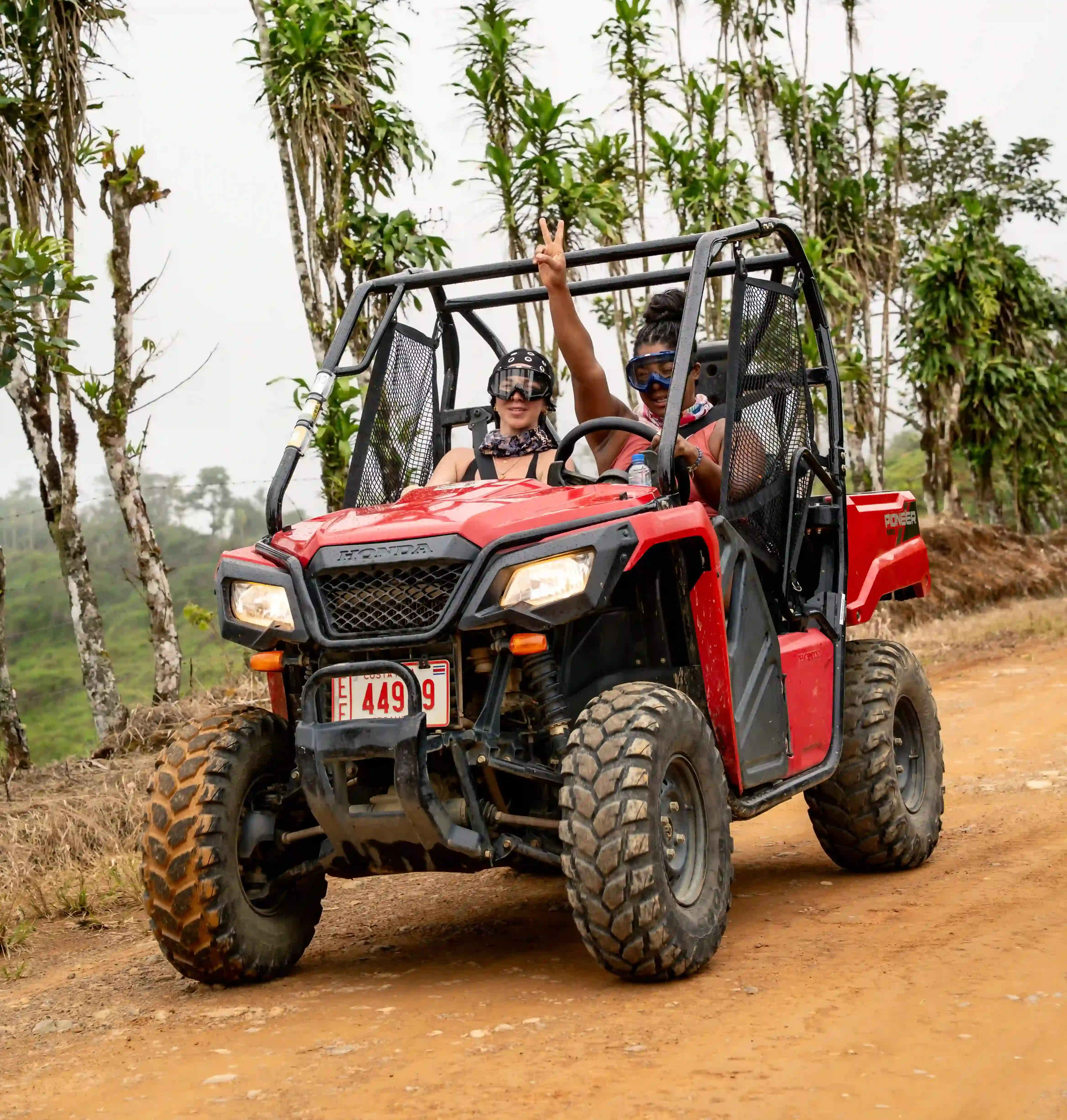 Guests enjoying an ATV adventure near Vajra Jahra Retreat Center, an exciting Corporate Retreat Venue in Costa Rica.