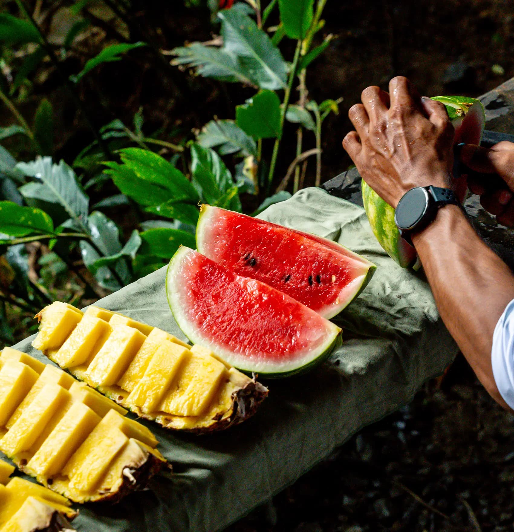 Fresh fruit by a waterfall at a Costa Rica wedding venue.
