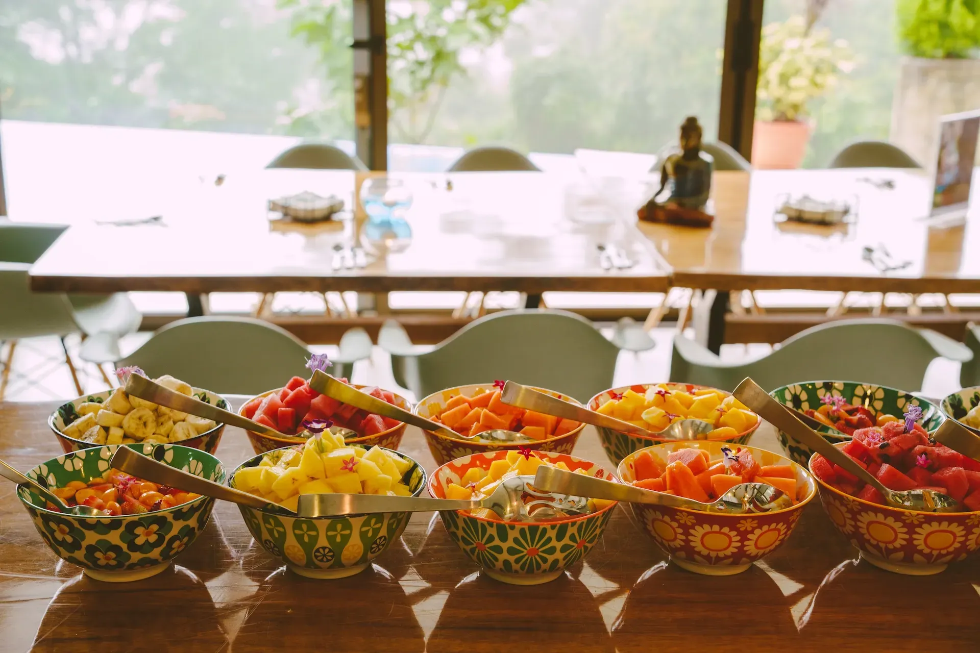 Colorful bowls of fresh tropical fruit displayed at a Costa Rica Retreat Center, highlighting the vibrant dining experience at Vajra Jahra.