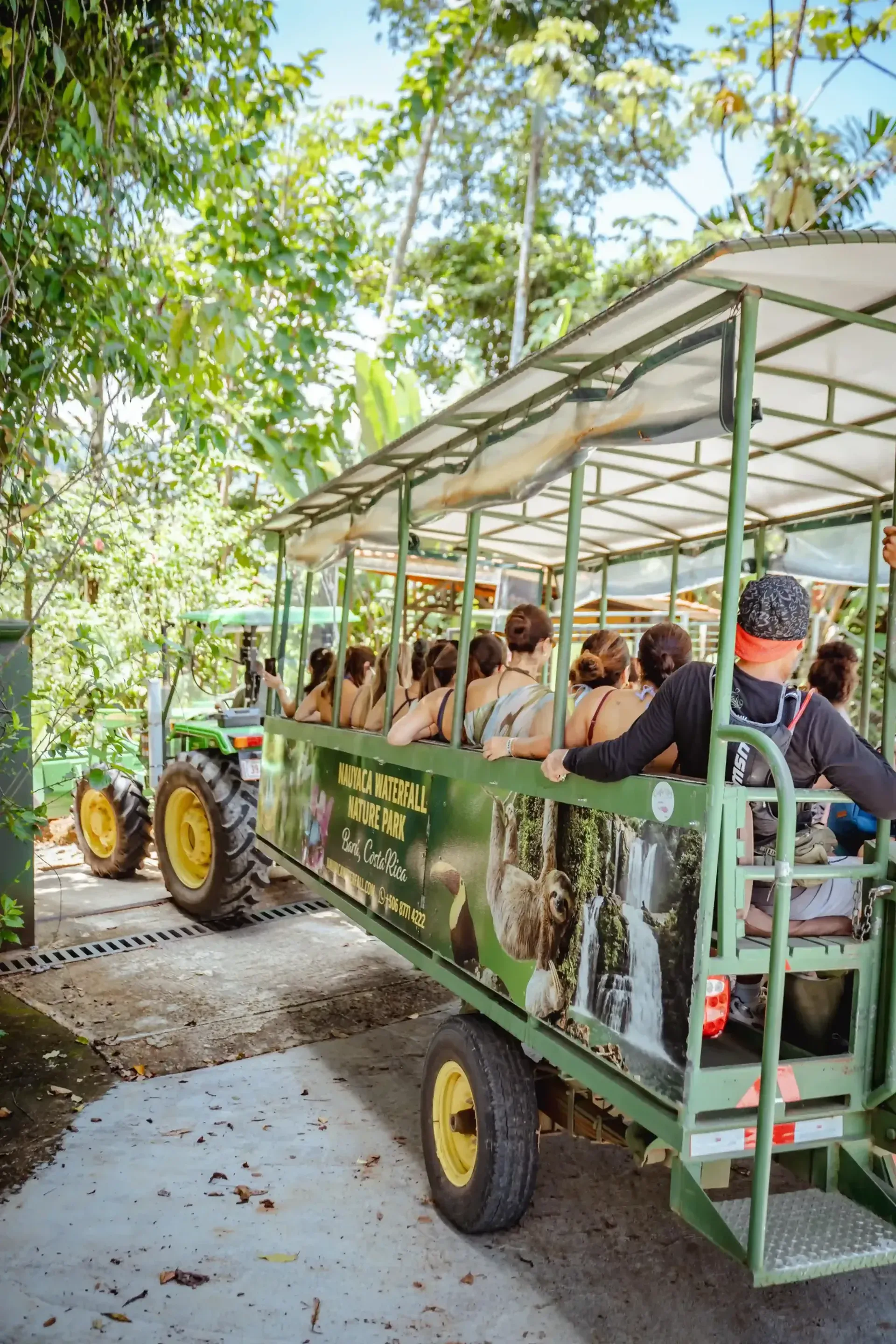 Group of retreat participants seated in a safari truck during an off-site adventure organized by Vajra Jahra, a Costa Rica Retreat Center.