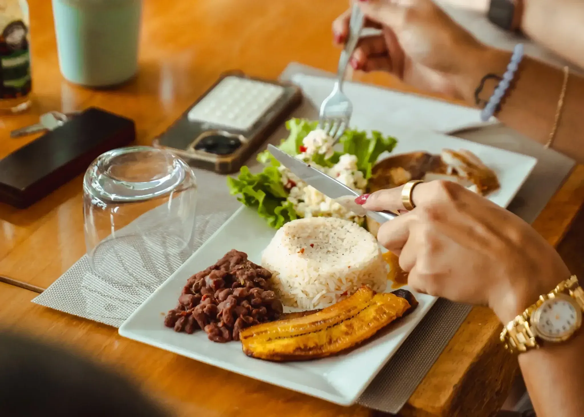 Guest enjoying a wholesome retreat meal at Vajra Jahra Retreat Center, showcasing the nourishing dishes available when you rent a retreat center.