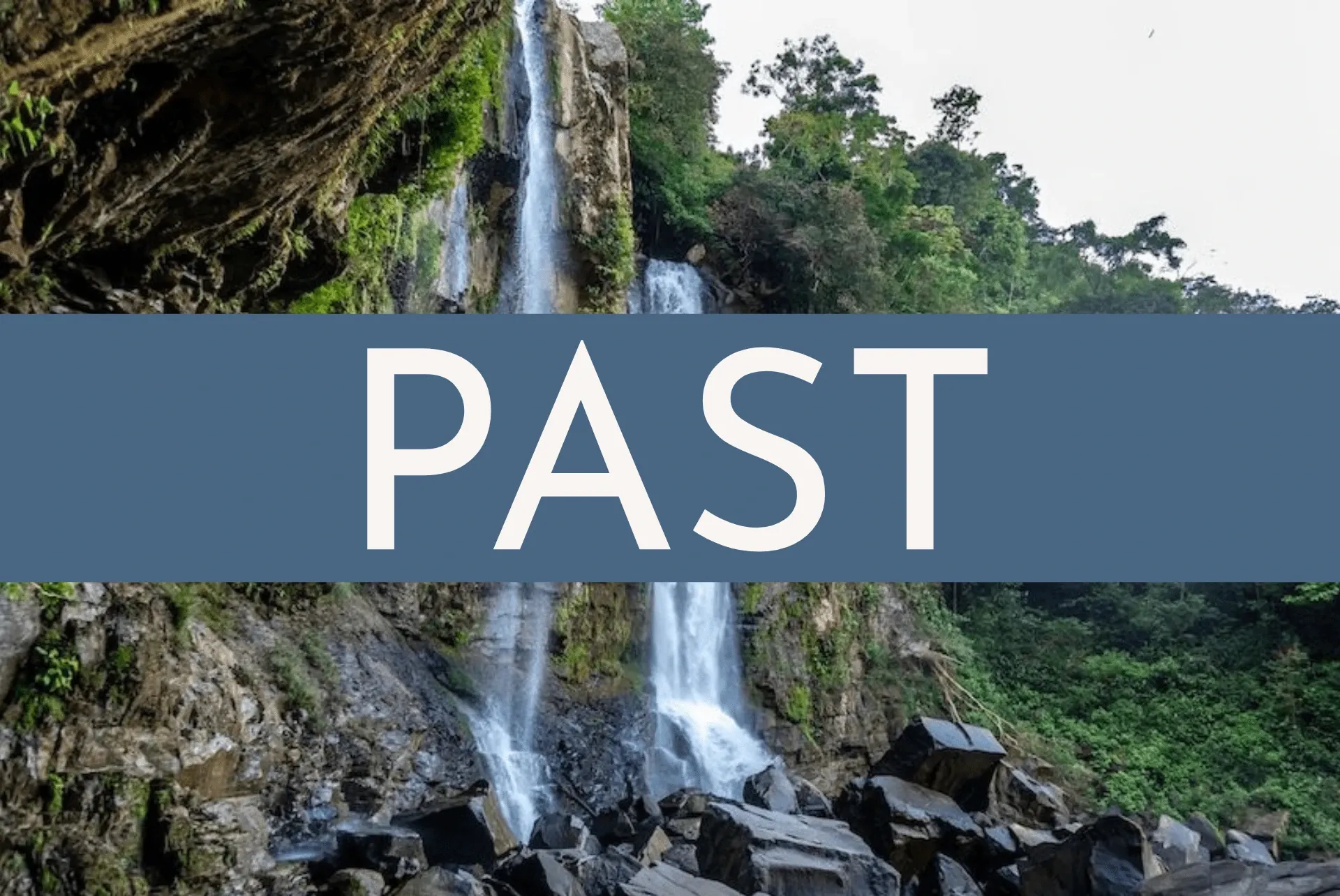 Waterfall surrounded by lush greenery at Vajra Jahra Retreat Center, representing the beauty and history of a retreat Costa Rica experiences.