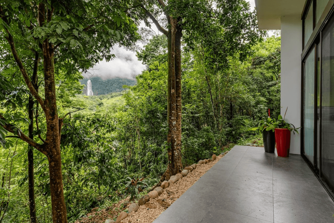wellness retreat center villa exterior waterfall view