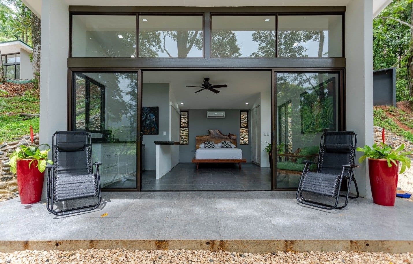Exterior view of one of Vajra Jahra’s cozy rainforest villas, some of the best villa rentals in Costa Rica.