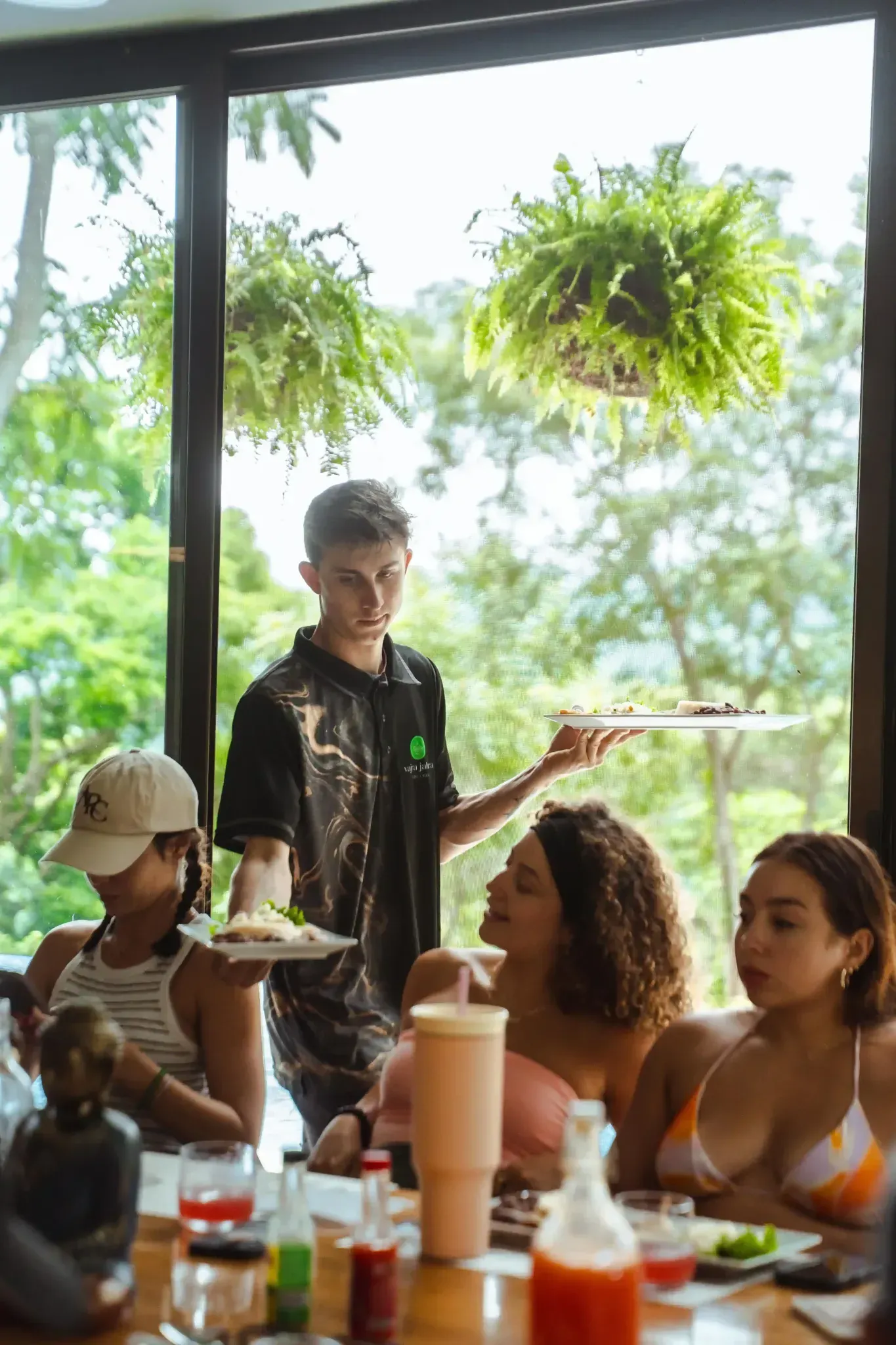 Guests sharing a fresh, locally inspired meal at Vajra Jahra Retreat Center, a Corporate Retreat Venue offering chef-prepared dining experiences.