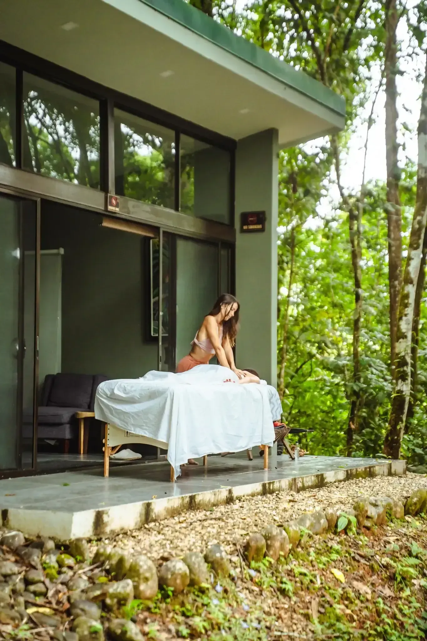 Outdoor massage table overlooking the forest at Vajra Jahra Retreat Center, a Costa Rica retreat center.