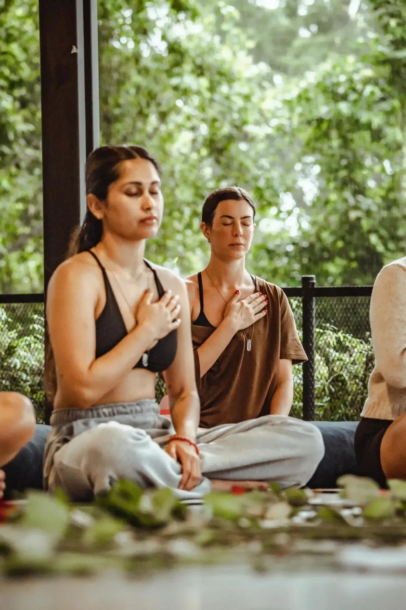 Group meditation session at Vajra Jahra Retreat Center, with guests seated in peaceful reflection an ideal setting for Family Reunion Vacation Rentals focused on wellness.
