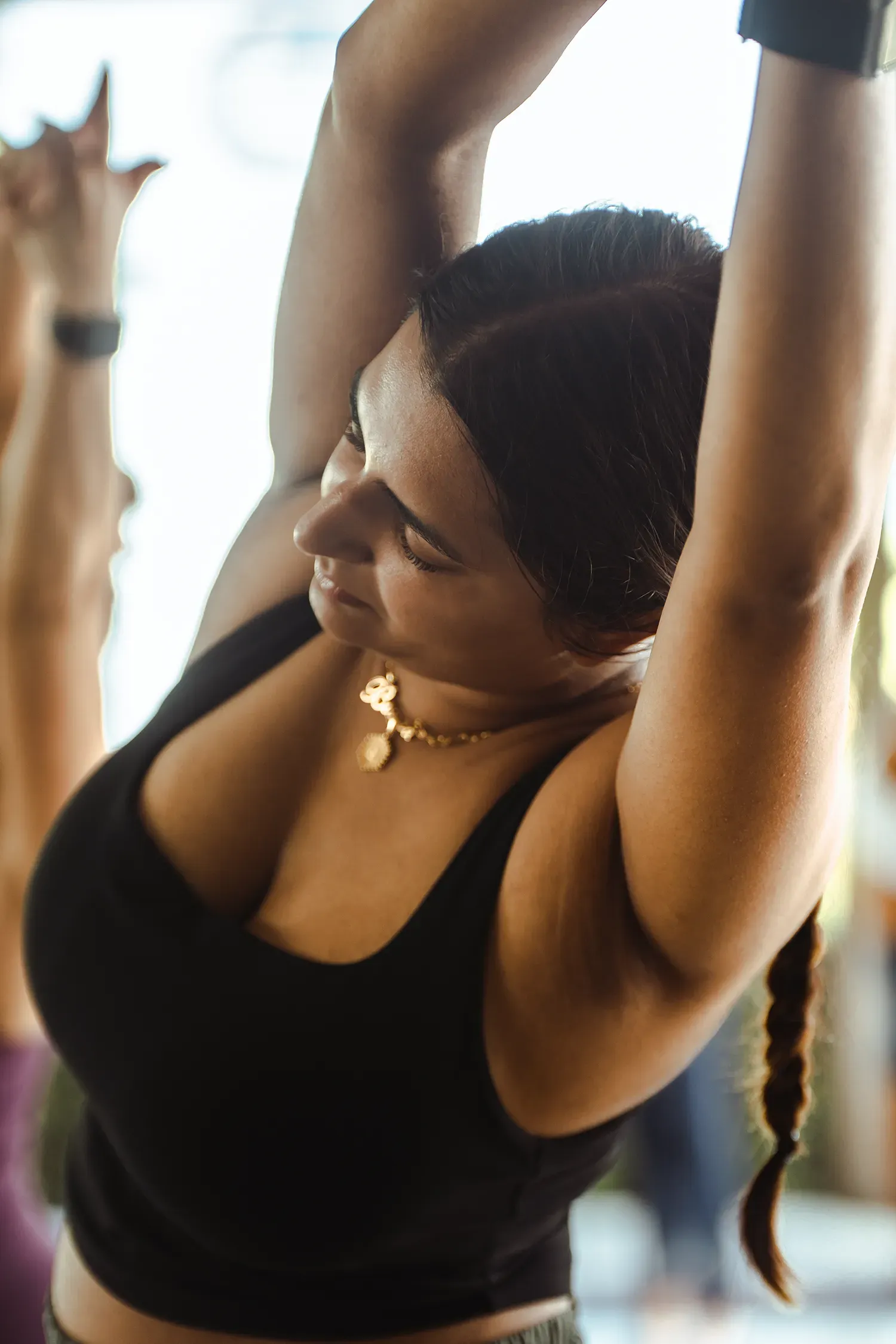 Woman practicing yoga during San Jose Costa Rica excursions focused on wellness and relaxation.