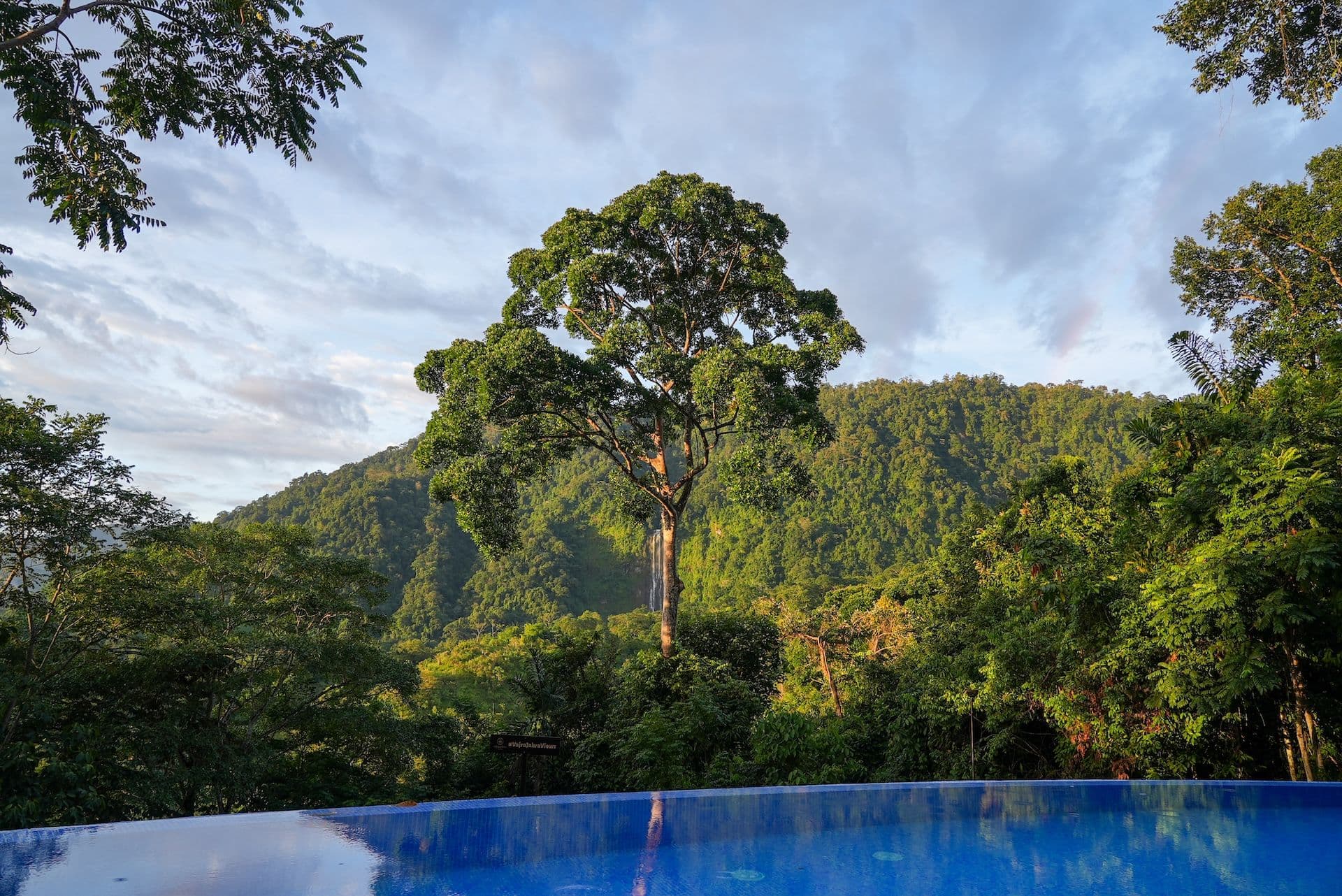 View of the infinity pool overlooking the Diamante Waterfalls at Vajra Jahra Retreat Center